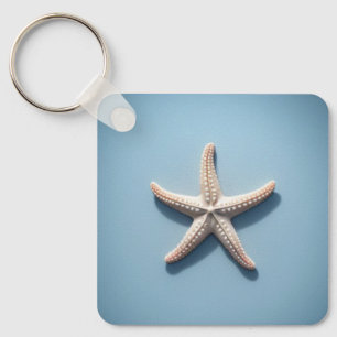 Porte-clés Poisson étoilé exotique avec Arrière - plan bleu