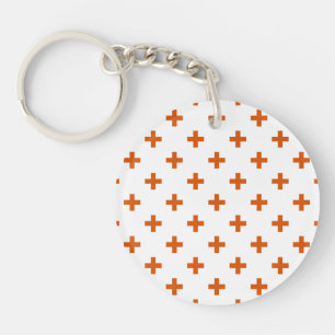 Porte-clés Polka orange croise sur blanc