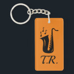 Porte-clés Porte - clé couleur personnalisé pour lecteur saxo<br><div class="desc">Porte - clé couleur personnalisé pour lecteur saxophone. Sexe avec notes de musique. Idée cadeau cool pour joueur,  fan de jazz,  musicien,  étudiant,  etc.</div>