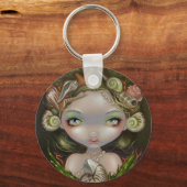 Porte-clés porte - clé "Couronne des coquilles" (Recto)