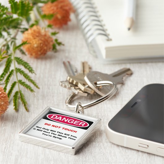 Porte-clés Porte - clé de danger (Côté)