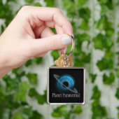 Porte-clés Porte - clé paranormal de planète (main)