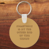 Porte-clés Porte - clé - QUELQUE CHOSE est à l'autre bout ... (Recto)