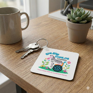 Porte-clés Porte - clé zébrée de sensibilisation à la SPE