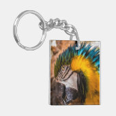 Porte-clés Portrait en macao bleu et jaune (Devant gauche)