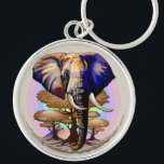 Porte-clés Portrait surréaliste de l'éléphant africain<br><div class="desc">Eléphant surréaliste d'Afrique,  vie sauvage Animal symbolique,  avec Acacia Trees,  et la montagne du Kilimandjaro sur l'Arrière - plan,  Pastel Colours Arrière - plan. Illustration vectorielle originale Copyright BluedarkArt TheChameleonArt.</div>