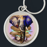 Porte-clés Portrait surréaliste de l'éléphant africain<br><div class="desc">Eléphant surréaliste d'Afrique,  vie sauvage Animal symbolique,  avec Acacia Trees,  et la montagne du Kilimandjaro sur l'Arrière - plan,  Pastel Colours Arrière - plan. Illustration vectorielle originale Copyright BluedarkArt TheChameleonArt.</div>