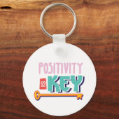 Porte-clés positivity is the key design  (Recto)