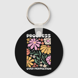 Porte-clés Progrès sur la perfection par le comportement du t