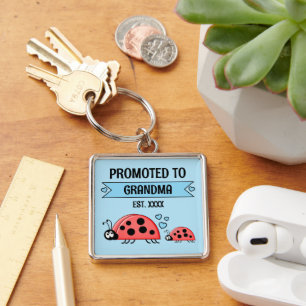 Porte-clés Promu au rang de grand-mère coccinelles bleues
