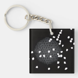 Porte-clés puzzle brisé noir et blanc