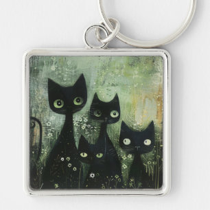 Porte-clés Quatre chats noirs avec des pâquerettes sur gris m
