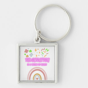 Porte-clés Rainbow Teaching est un travail de coeur