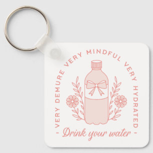 Porte-clés Rappel d'eau potable préppy demure rose pure esthé