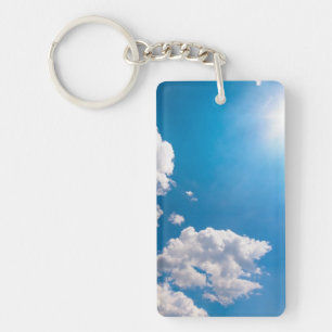 Porte-clés Rayon de Sun éclaté par derrière un nuage
