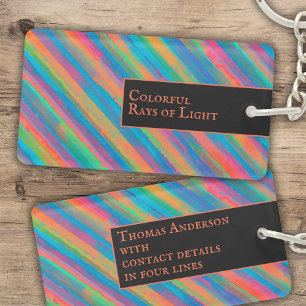 Porte-clés Rayons de lumière colorés tombant dans l'obscurité