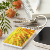 Porte-clés Rayons dorés traversant un gros ananas (Devant droit)