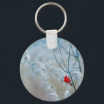 Porte-clés Red Cardinal dans Winter Nature Photo de Christmas<br><div class="desc">Un porte - clé avec une photo nature pittoresque avec un cardinal rouge vif. Contrasté par rapport à un arrière-plan hivernal extérieur avec la neige tombant doucement vers le bas.</div>