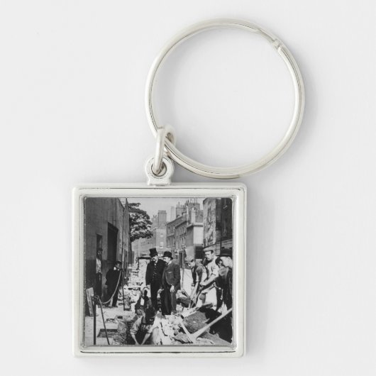 Porte-clés Réparation d'un tuyau (Devant)