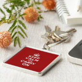 Porte-clés Restez calme et poursuivez (Côté)