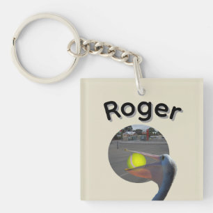 Porte-clés Roger nom avec pélican attrapant une balle,