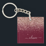 Porte-clés Rose Bourgogne Gold Blush Pink Parties scintillant<br><div class="desc">Burgundy et Rose Gold Blush rose Faux Foil Parties scintillant étincelante Script Monogramme Nom Porte - clé. Cela rend le cadeau parfait pour 16 ans,  mariage,  douche nuptiale,  anniversaire,  baby shower ou bachelorette pour quelqu'un qui aime le luxe glam et les styles chic.</div>