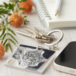 Porte-clés Rose un chat aux yeux verts saisissants