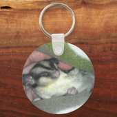 Porte-clés Saigneuse à sucre dormant dans la couverture (Recto)