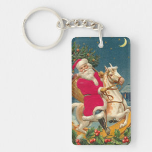 Porte-clés Santa Claus on a wooden horse