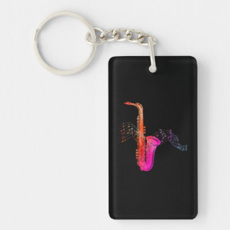 Porte-clés Saxophone coloré sur la feuille de musique pour sa