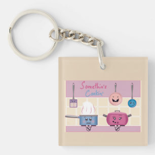 Porte-clés Scène de cuisine romantique amusante avec ustensil