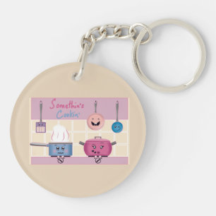 Porte-clés Scène de cuisine romantique et drôle avec ustensil
