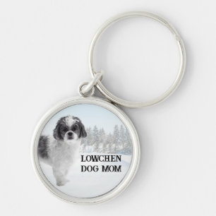 Porte-clés Scène hivernale de maman de chien Lowchen