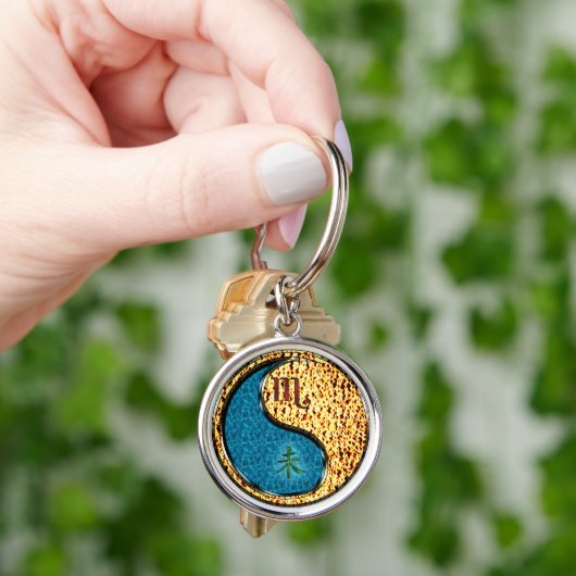 Porte-clés Scorpio & Chèvre de feu (main)