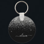 Porte-clés Script Monogram Girly Name<br><div class="desc">Parties scintillant à étincelles noir et argent Script Monogramme Nom Clés (Porte - clé). Cela rend le cadeau parfait pour 16 ans,  mariage,  douche nuptiale,  anniversaire,  baby shower ou bachelorette pour quelqu'un qui aime le luxe glam et les styles chic.</div>