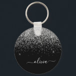 Porte-clés Script Monogram Girly Name<br><div class="desc">Parties scintillant à étincelles noir et argent Script Monogramme Nom Clés (Porte - clé). Cela rend le cadeau parfait pour 16 ans,  mariage,  douche nuptiale,  anniversaire,  baby shower ou bachelorette pour quelqu'un qui aime le luxe glam et les styles chic.</div>