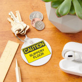 Porte-clés Signal de sol à nappes de prudence