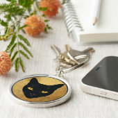 Porte-clés Silhouette de chat noir sur un cercle doré (Côté)