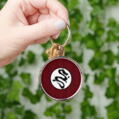 Porte-clés Silhouette de dragon noir sur les rayures rouges (Main)