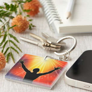 Porte-clés Silhouette d'homme spirituel levant les bras