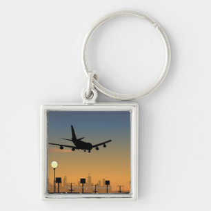 Porte-clés Silhouette d'un avion en vol