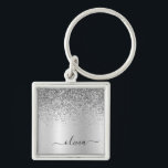 Porte-clés Silver Glitter Glam<br><div class="desc">Argent Faux Foil Parties scintillant à étincelles métalliques brossé Monogramme Nom Clés (Porte - clé). Cela rend le cadeau parfait pour 16 ans,  mariage,  douche nuptiale,  anniversaire,  baby shower ou bachelorette pour quelqu'un qui aime le luxe glam et les styles chic.</div>