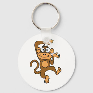 Porte-clés Singe heureux de danse de HACHE