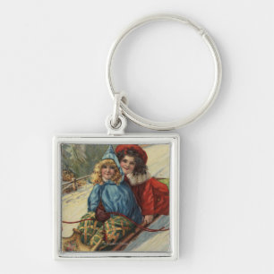 Porte-clés Sledding de petites filles de ChristmasTwo