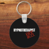 PORTE-CLÉS SOMBRE D'HYPNOTHÉRAPEUTE HORS SERVICE (Recto)