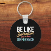 Porte-clés Soyez comme la soustraction, faites une différence (Recto)