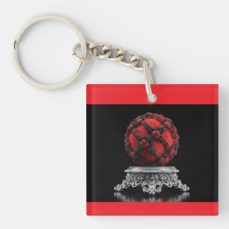 Porte-clés Sphère de Mandelbrot rouge et noir sur piédestal a