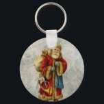 Porte-clés Style vintage Père Noël Père Noël<br><div class="desc">Une image vintage du Père Noël classique portant son célèbre manteau rouge et portant un sac plein de jouets. Ce vieux Père Noël, aussi connu sous le nom de Saint Nicolas, est mince et tient un bâton de marche pour voyager à travers le pays donnant des jouets à toutes les...</div>
