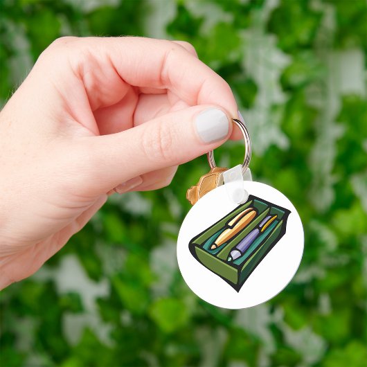 Porte-clés Stylos Dans Une Boîte