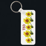 Porte-clés Sunflower Keychain<br><div class="desc">Display a natural vibe with this abundance of amber sunflowers keychain. This design has a warm feel due to its amber and orange palette. Express yourself by experimenting with different background colors and added text.</div>